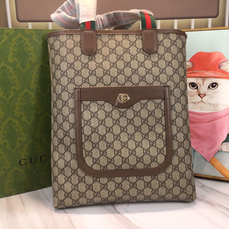 G*u*i shopping bags